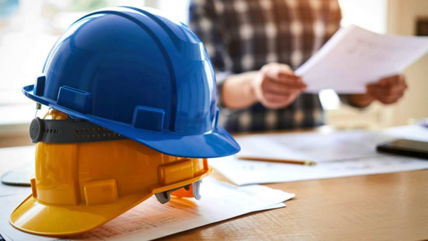 Contractor reviewing approved performance bond forms for construction projects