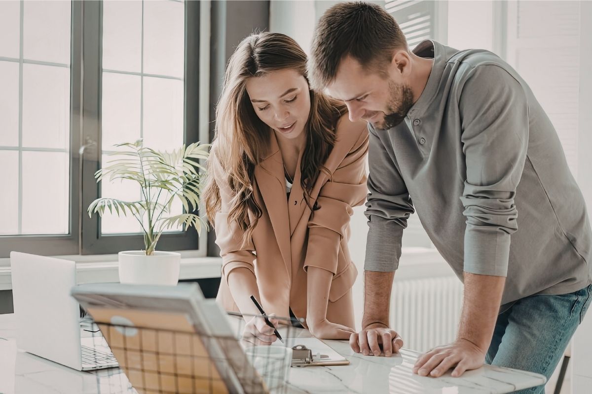 Family members reviewing VA fiduciary bond paperwork together at home