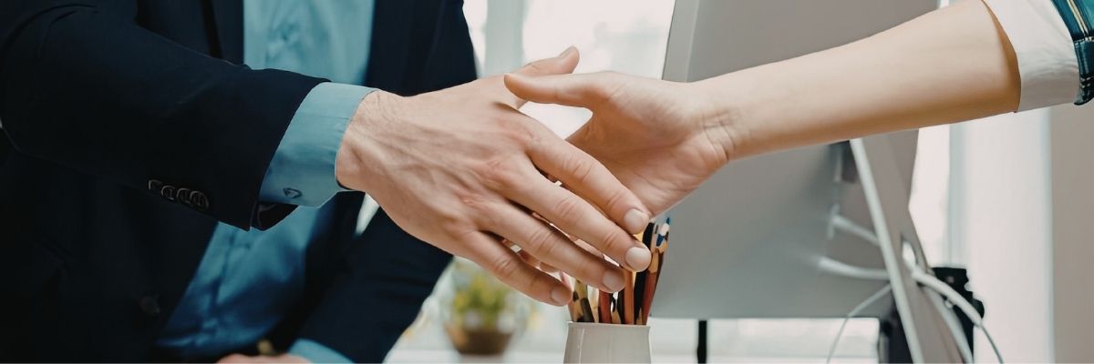 Client and surety bond agent shaking hands after VA fiduciary bond approval
